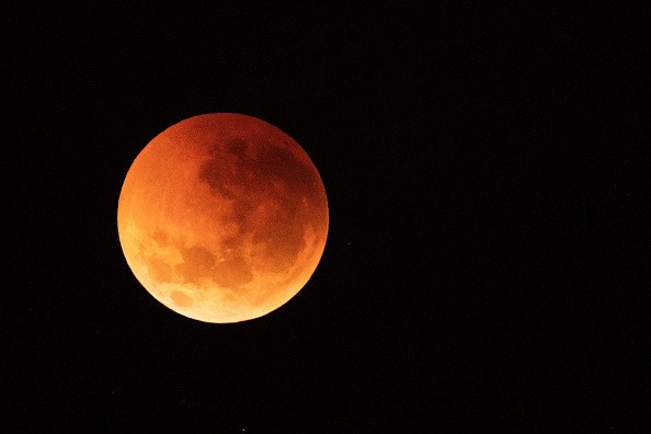 Moon is turning red during a total lunar eclipse