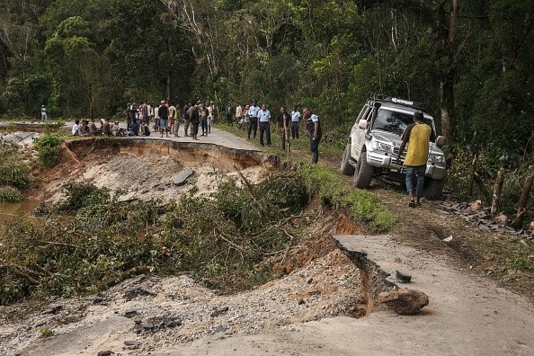 Partially collapsed RN25 road in Ranomafana after the passage of cyclone Batsirai.