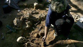 An Israeli archeologist excavates an ancient Roman cemetery