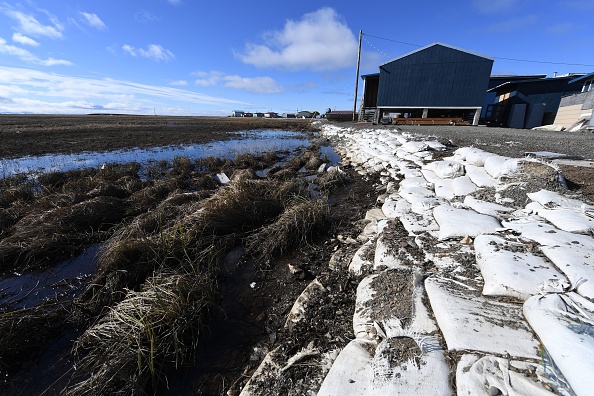 What is the connection between thawing Arctic permafrost and lung cancer?