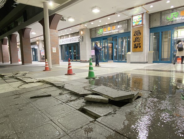  Damaged pavement blocks on the ground in front of JR Fukushima Station, cracked due to the impact of the earthquake in Fukushima.