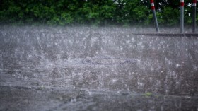 Rainfall on street in Stuttgart, Germany during summer thunder