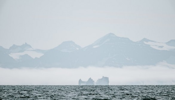 Iceberg in the Arctic on a hazy afternoon