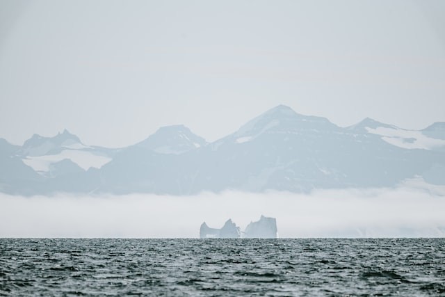 Iceberg in the Arctic on a hazy afternoon