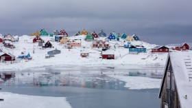 Town of Aasiaat (Greenland) during winter season. Photo by Filip Gielda - Visit Greenland