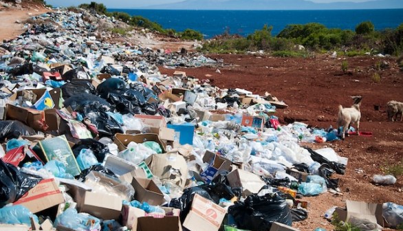 Mountain of rubbish and garbage on the beach by the sea