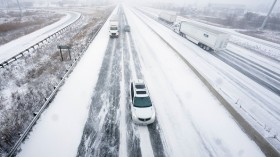 Snow-covered Highway 401 in London, Ontario, Canada, during a large winter storm on December 23, 2022