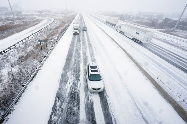 Snow-covered Highway 401 in London, Ontario, Canada, during a large winter storm on December 23, 2022