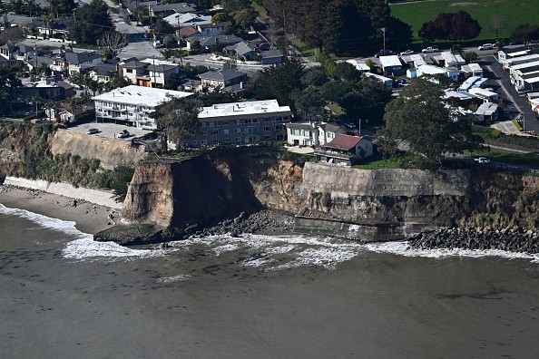 California to view damage caused by recent heavy storms on January 19, 2023