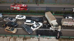 An aerial view of a major car accident on the highway near Yingshang, Anhui province in eastern China on November 15, 2017