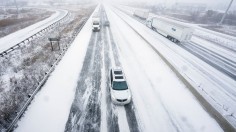 Highway 401 in London, Ontario, Canada, during a large winter storm on December 23, 2022. Canada Weather Forecast: Heavy Snow, Foggy Conditions Result in Flight Cancellations, Schools Closures 