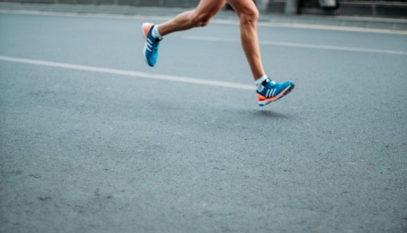 pair of blue-and-white Adidas running shoes