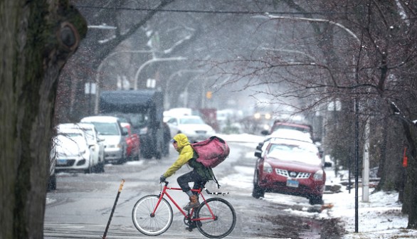 Chicago, Illinois. The latest weather forecast said that Chicago residents could expect possible rain and snow this week, adding a possibility of milder conditions. 