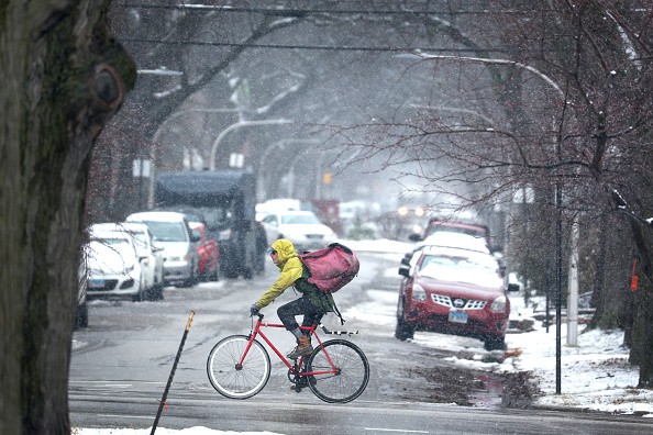 Chicago, Illinois. The latest weather forecast said that Chicago residents could expect possible rain and snow this week, adding a possibility of milder conditions. 