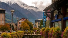 a small bridge over a small river in a town photo