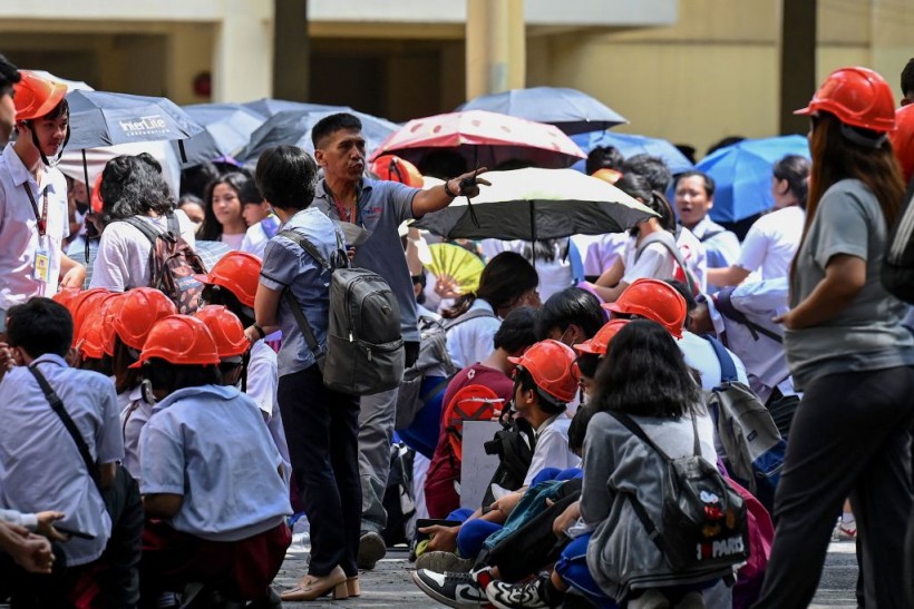 Evacuations in  a building in Manila. 