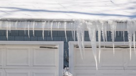  Icicles hang off a roof 