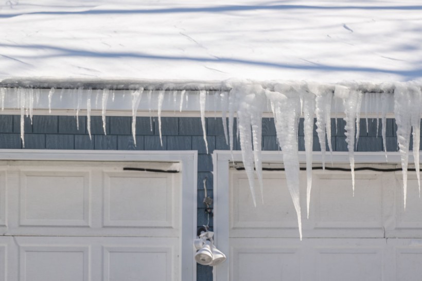  Icicles hang off a roof 