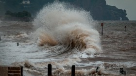  sea waves crashing on shore during daytime