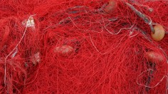 Old fishing net in the fishing port of Trapani Italy Sicily