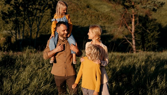 Medium shot parents and kids in nature