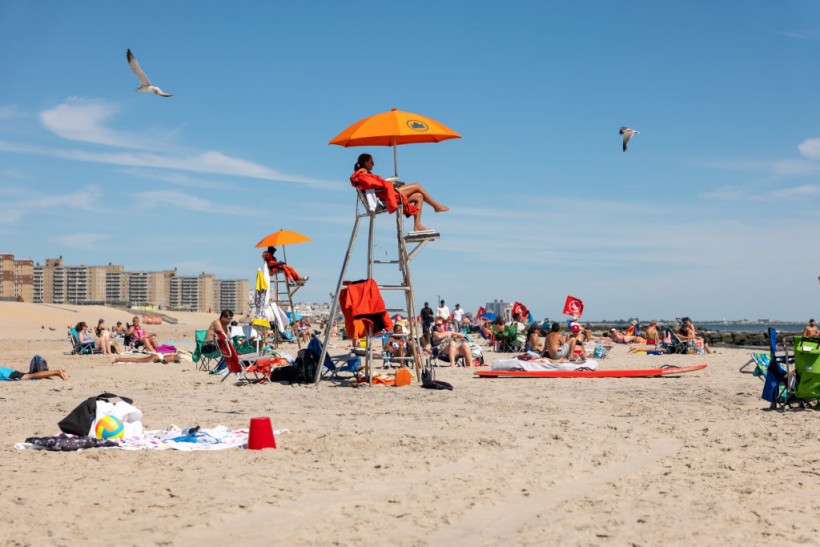 Swimmers at Rockaway Beach in New York 