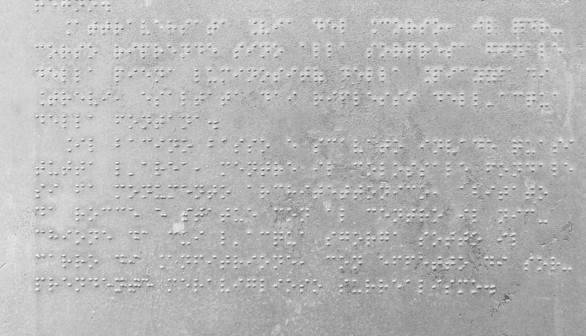 Sign in Braille explaining the history of the Trevi Fountain, Rome, Italy