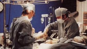 Technicians prepare a body for cryopreservation