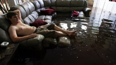 Boy in house after Katrina