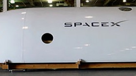 Quarter section of the 5.2 m Falcon 9 fairing at SpaceX's Hawthorne, CA headquarters.