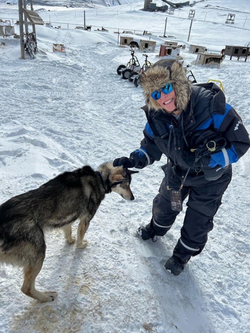 Par for the Norse: Franci Neely pets a local pup in Norway