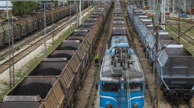 A stock photo a train carrying loads of coal