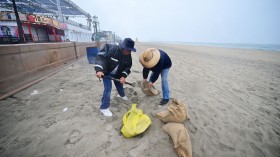 People are filling bags with sand in San Diego, California